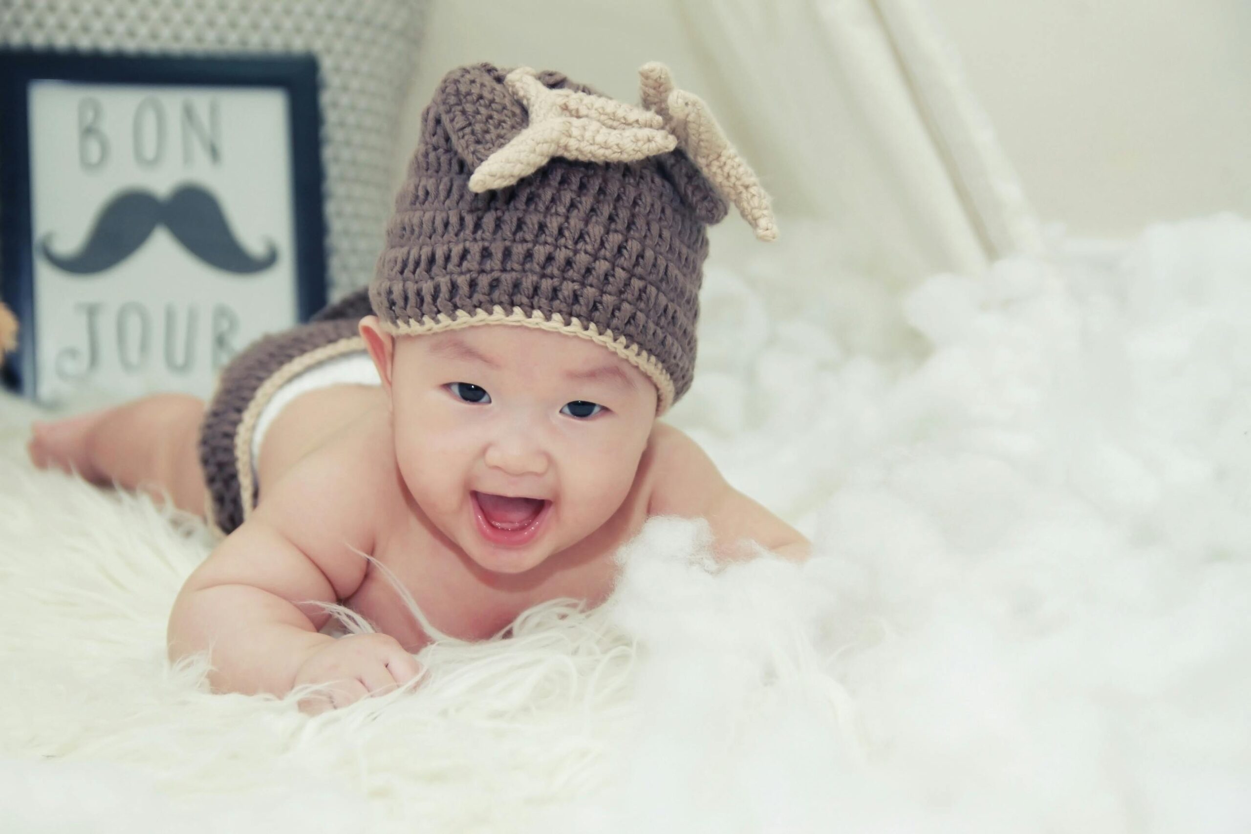 Newborn lifting head during tummy time