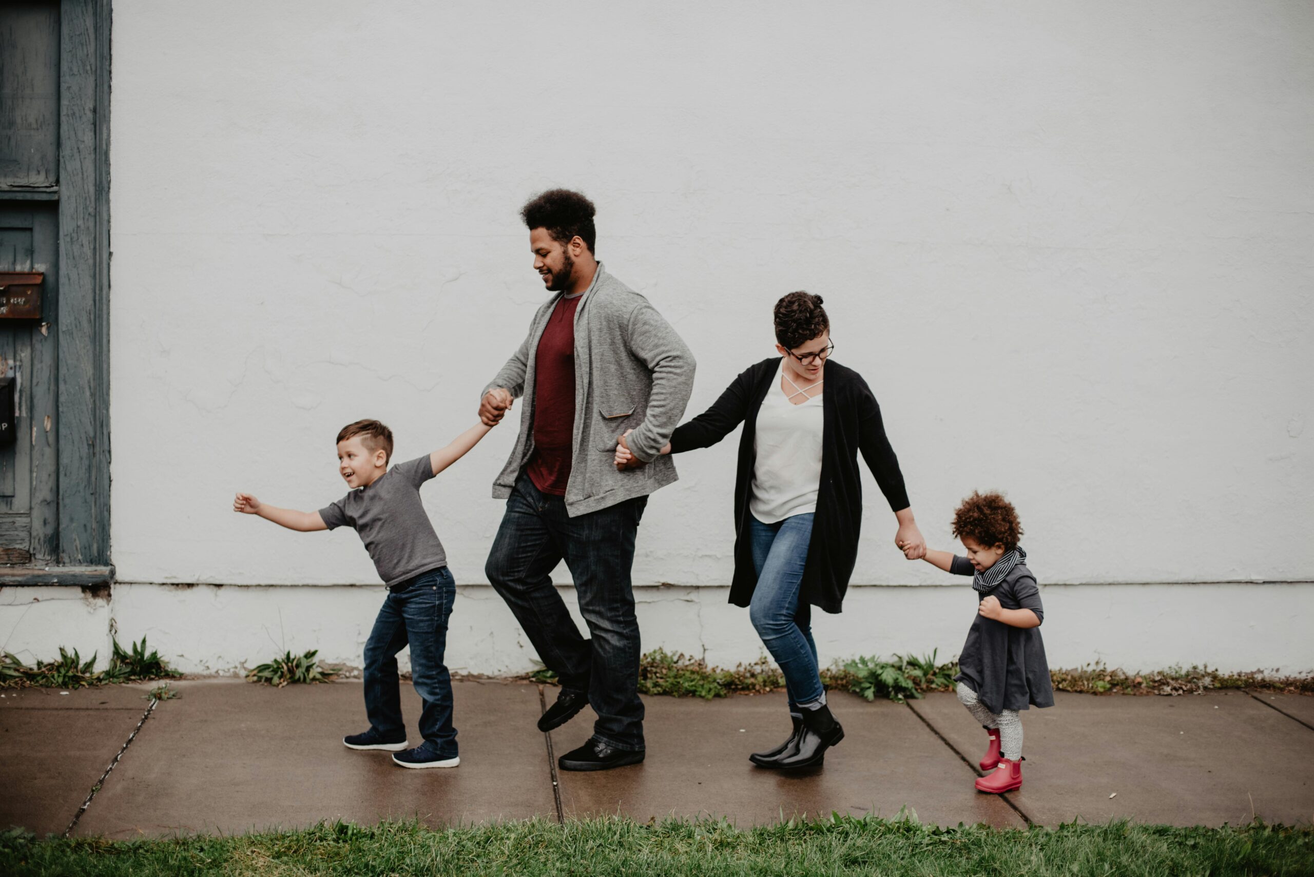 Happy family supporting child physical development and emotional development